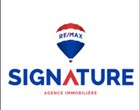 RE/MAX Signature M.C.