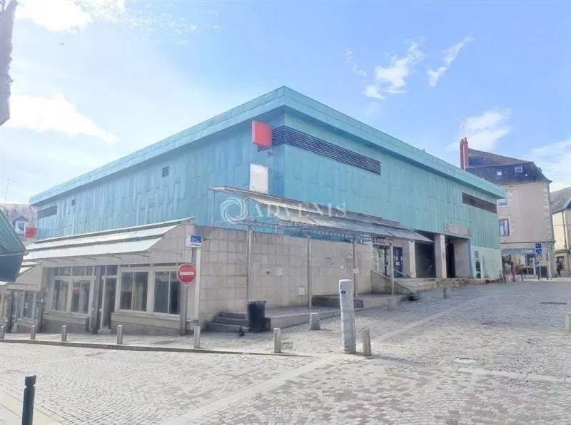 Location Commerce 985 m² - Photo 1