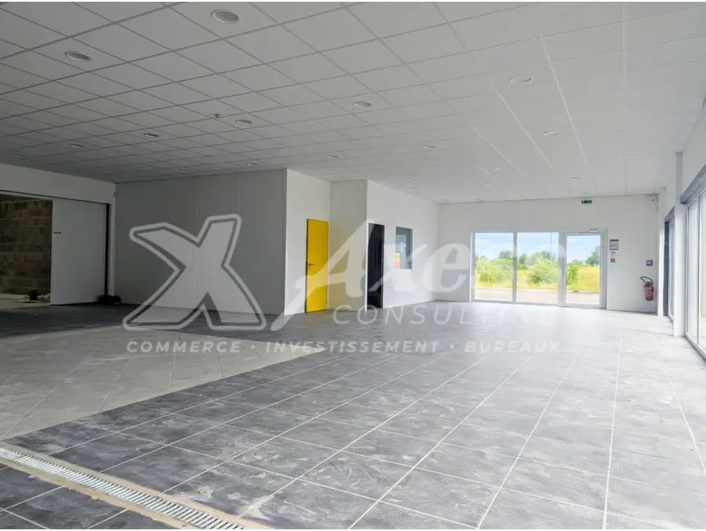 Location Commerce 414 m² - Photo 1