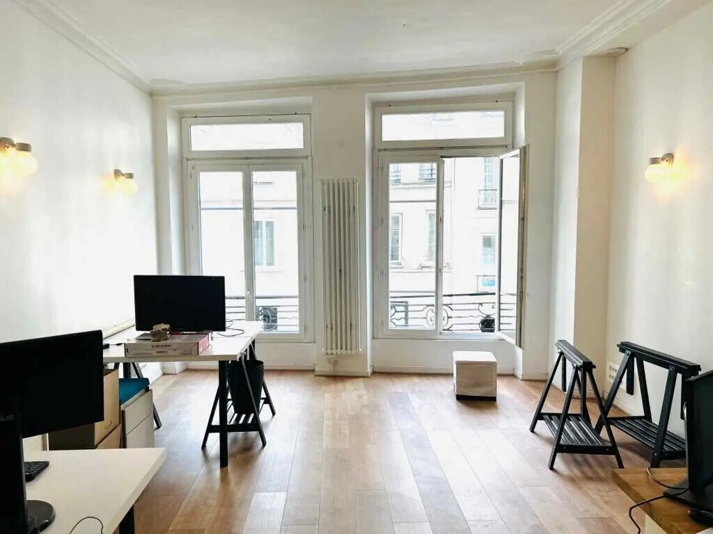 Location Bureaux 55 m² - Photo 1