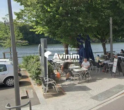 Location Commerce 131 m² - Photo 1