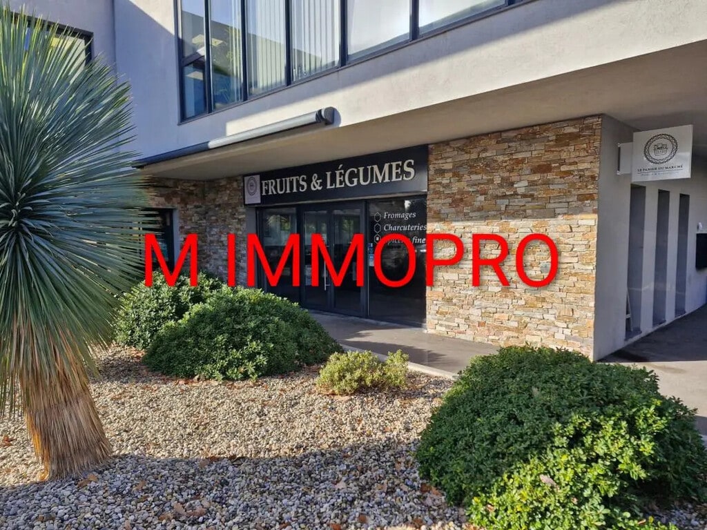 Location Commerce 65 m² - Photo 1