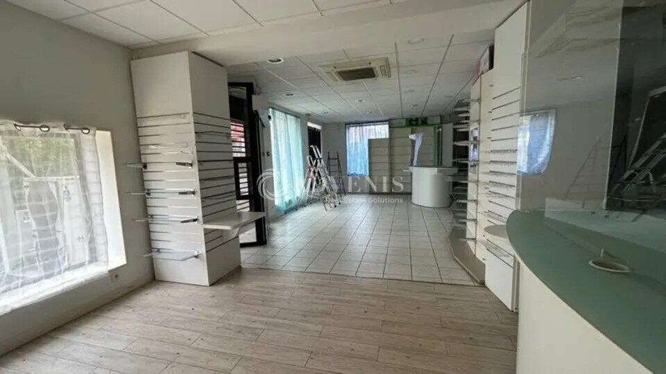 Location Commerce 113 m² - Photo 1