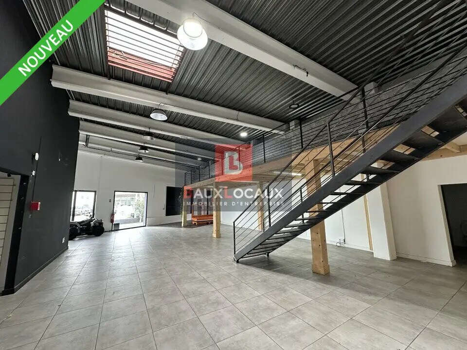 Location Commerce 609 m² - Photo 1
