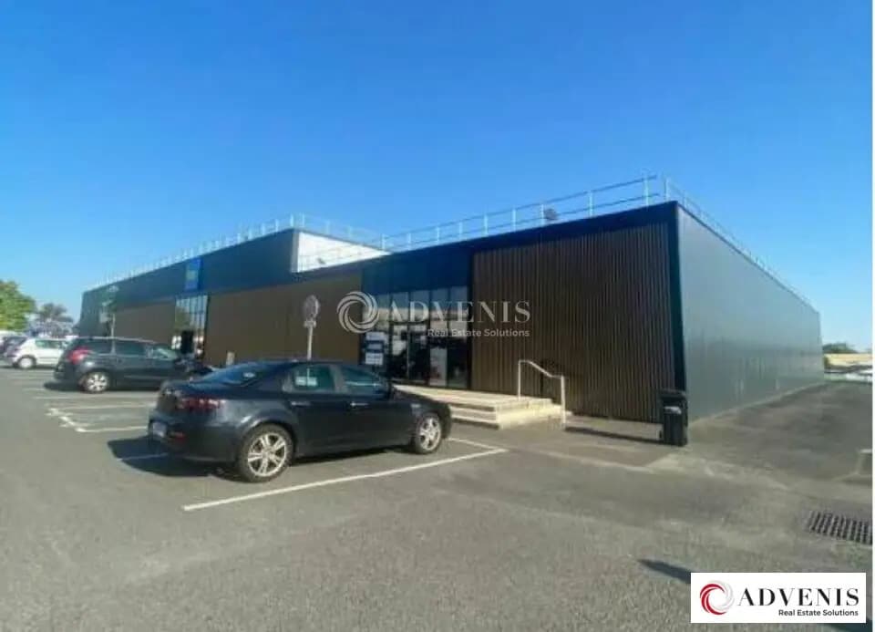 Location Commerce 572 m² - Photo 1