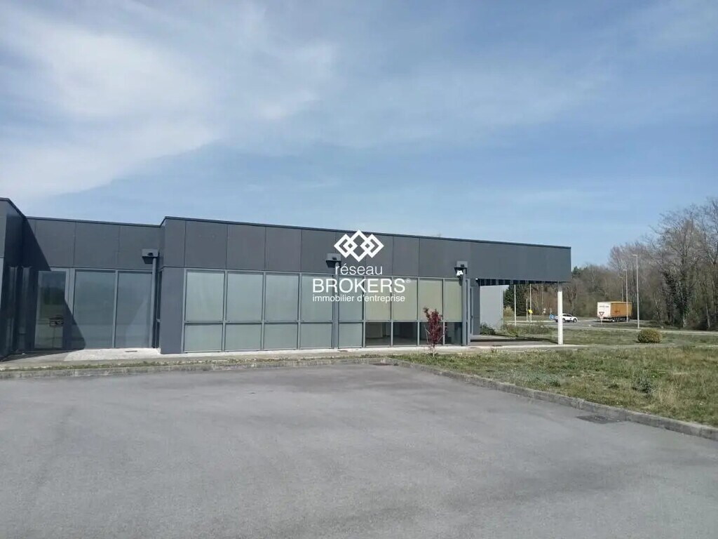 Location Commerce 1 245 m² - Photo 1