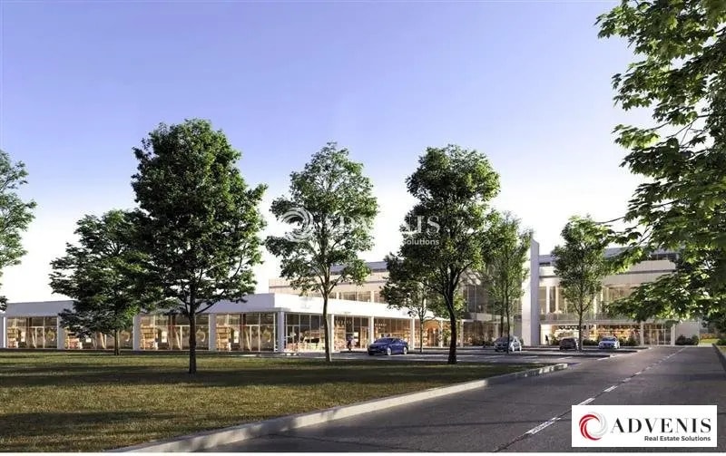 Location Commerce 700 m² - Photo 1