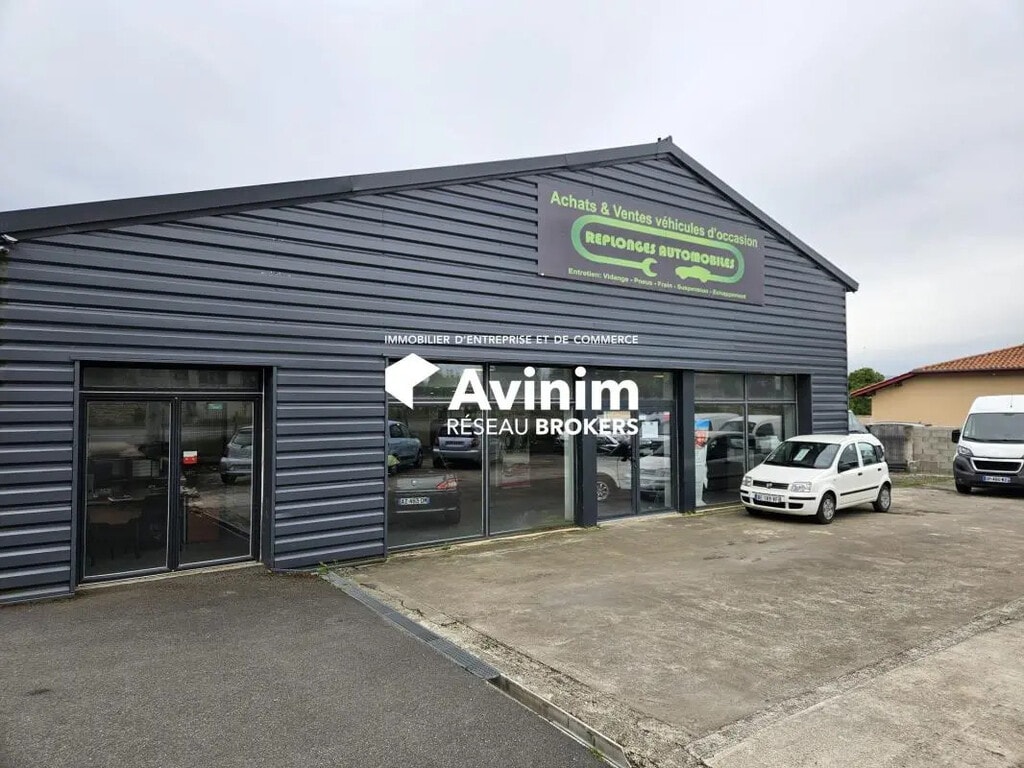 Location Commerce 831 m² - Photo 1