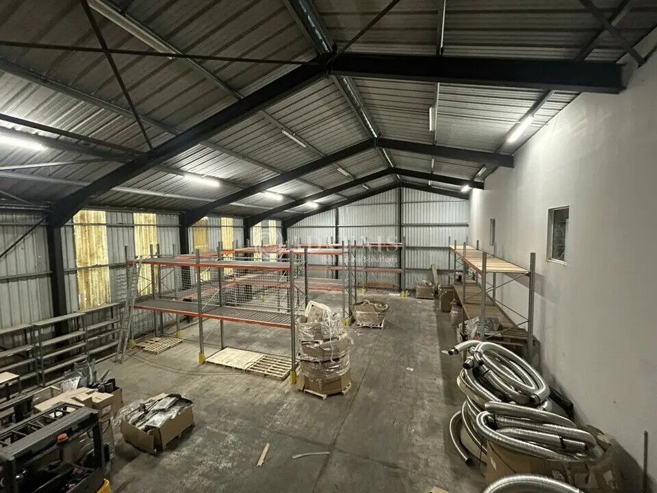 Location Entrepôt 660 m² - Photo 1