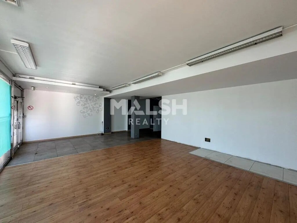 Location Commerce 270 m² - Photo 1
