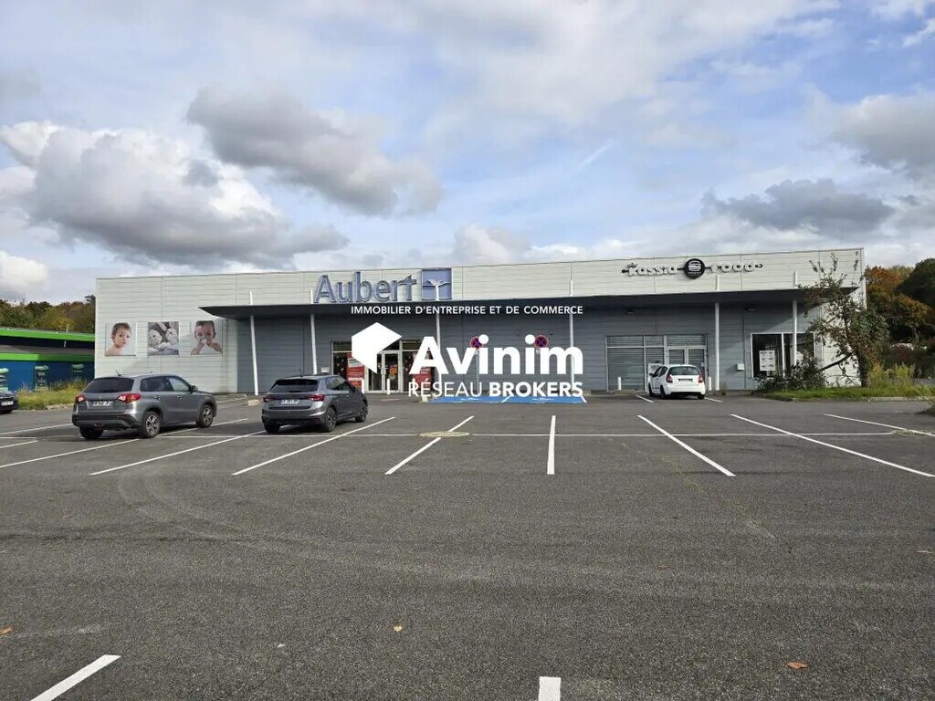 Location Commerce 1 142 m² - Photo 1