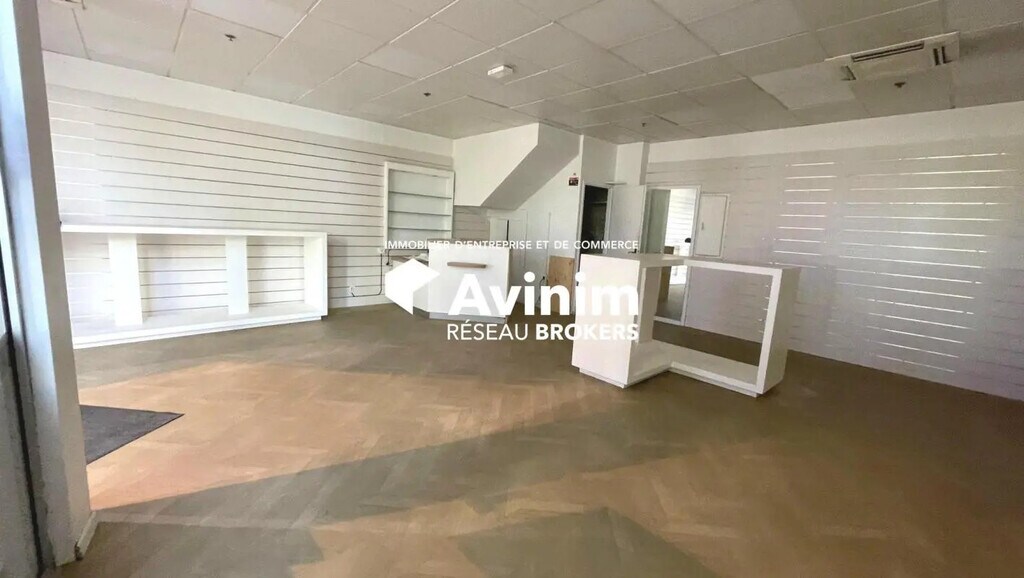 Location Commerce 87 m² - Photo 1