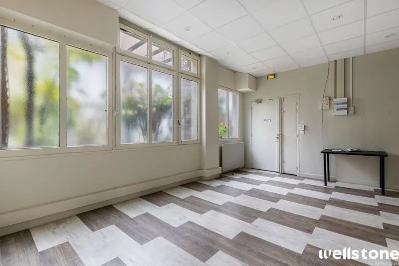 Location Bureaux 128 m² - Photo 1
