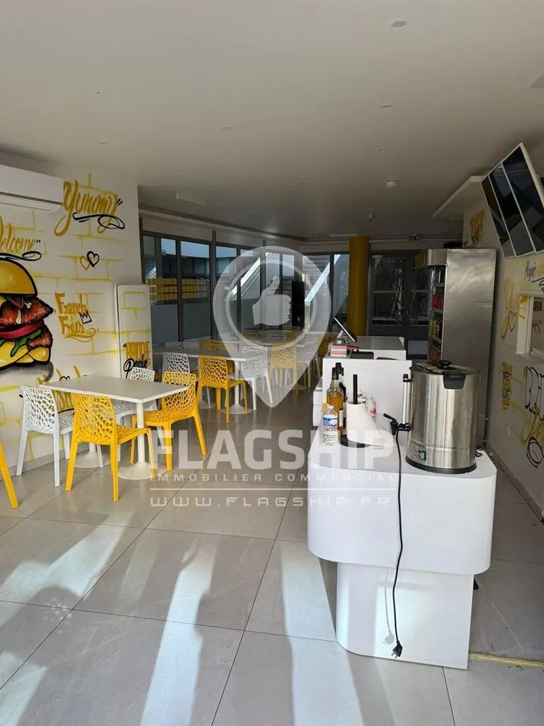 Location Commerce 107 m² - Photo 1