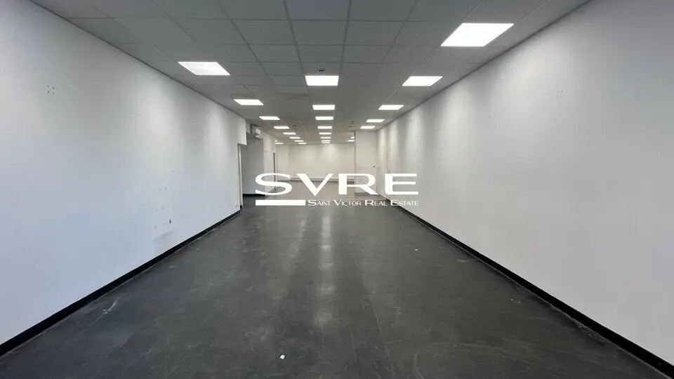 Location Commerce 122 m² - Photo 1