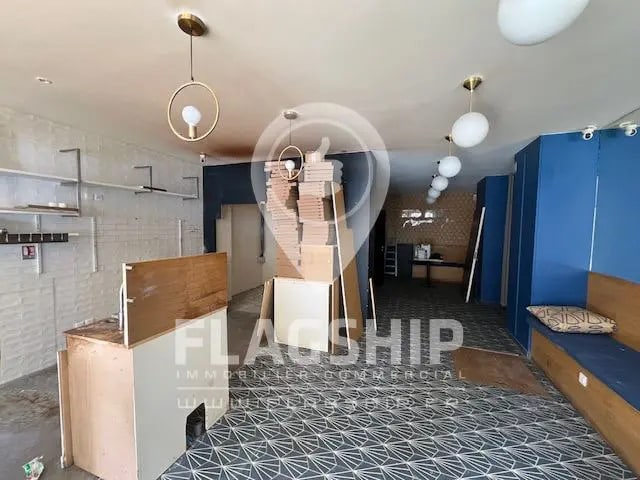 Location Commerce 120 m² - Photo 1