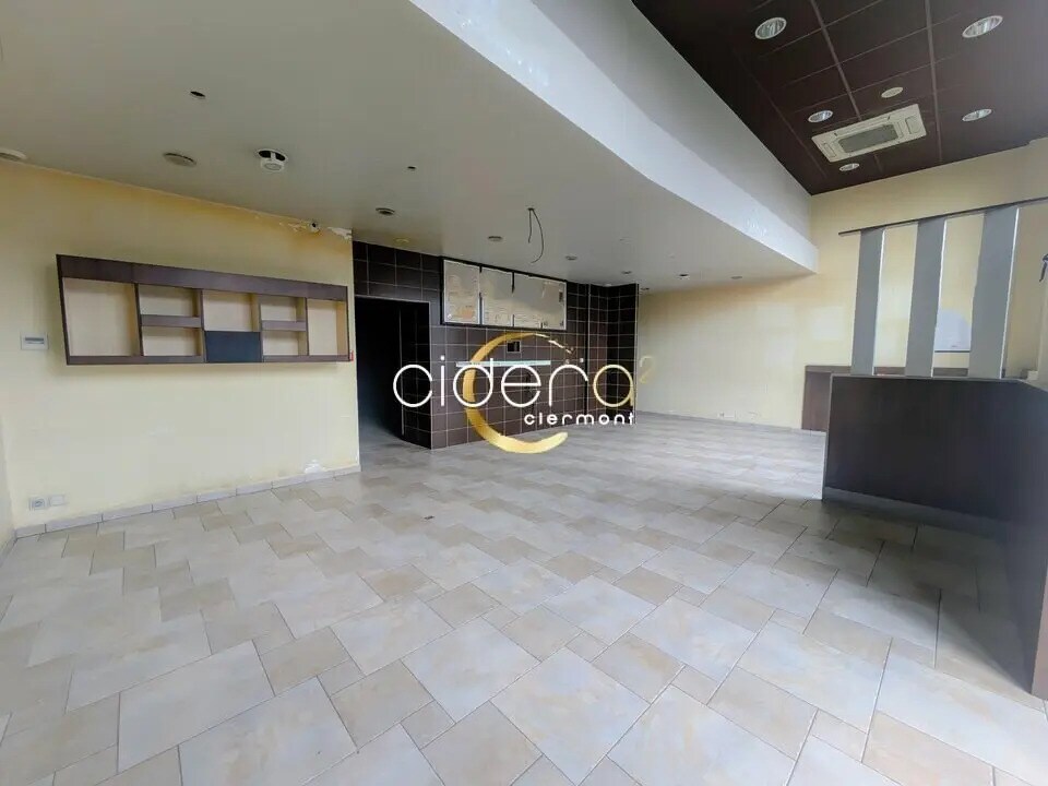 Location Commerce 148 m² - Photo 1