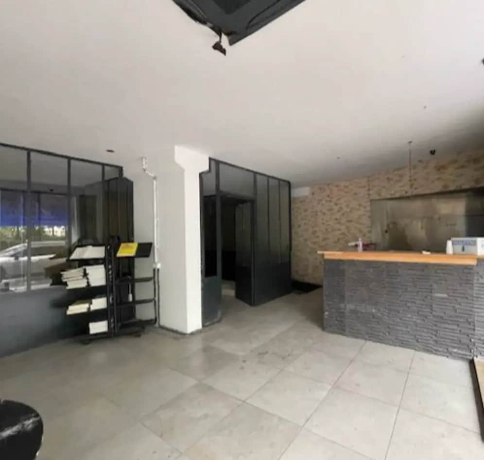 Location Commerce 148 m² - Photo 1