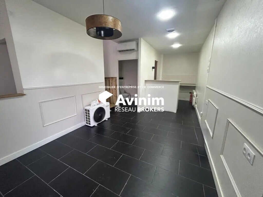 Location Commerce 58 m² - Photo 1